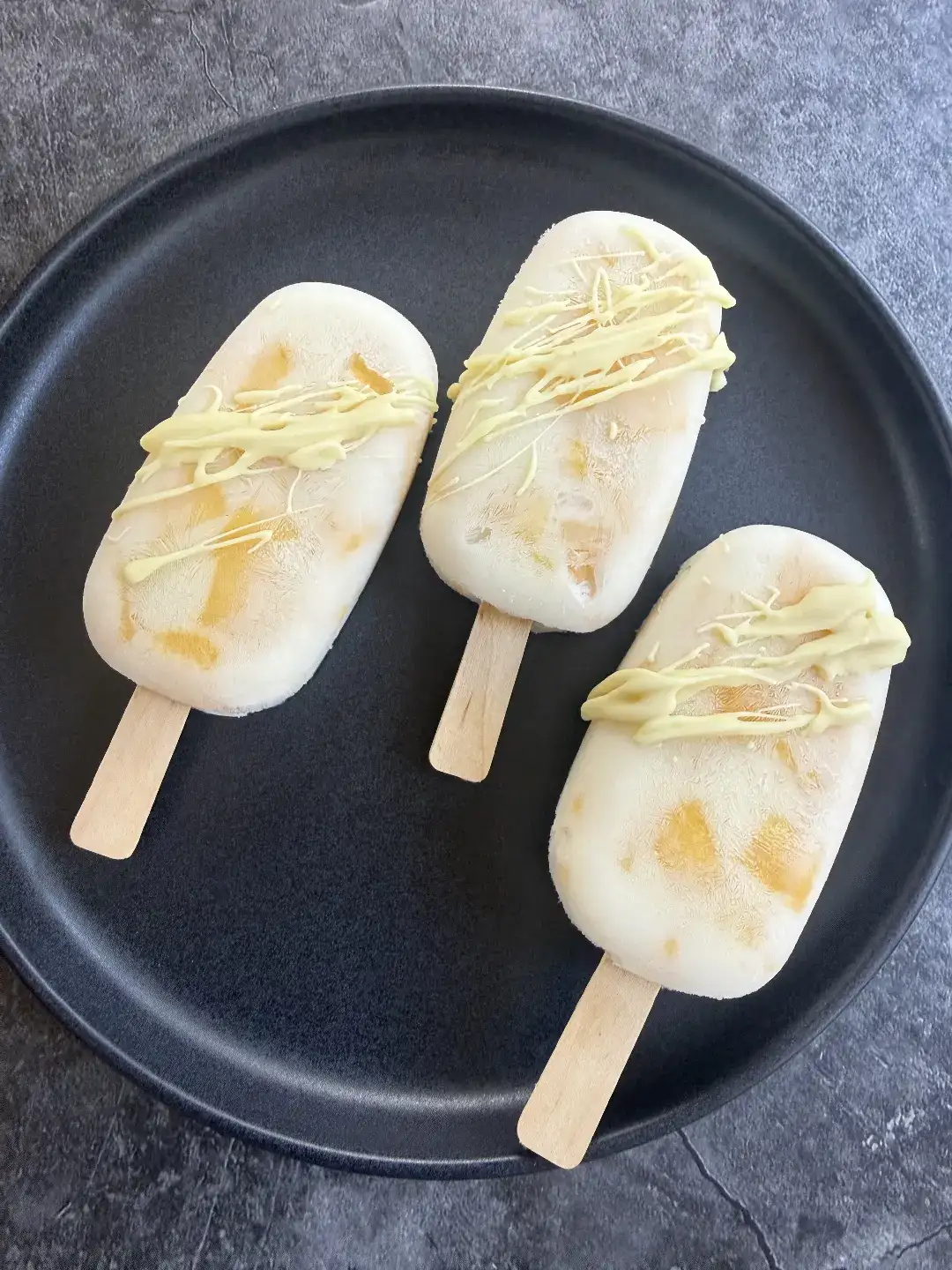 Frozen Mango Yogurt Popsicles
